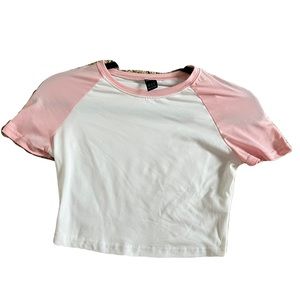 super cute and trendy baby tee crop top with pink sleeves goes with every outfit
